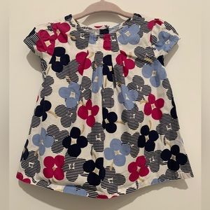 Gymboree girls short sleeve flower patterned top. Size 12-18 months.
